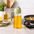 Pack of 2 Oil Dispenser Bottles – 2 - in - 1 Spray & Pour | BPA Free Kitchen Oil Sprayer - Wellhomes™